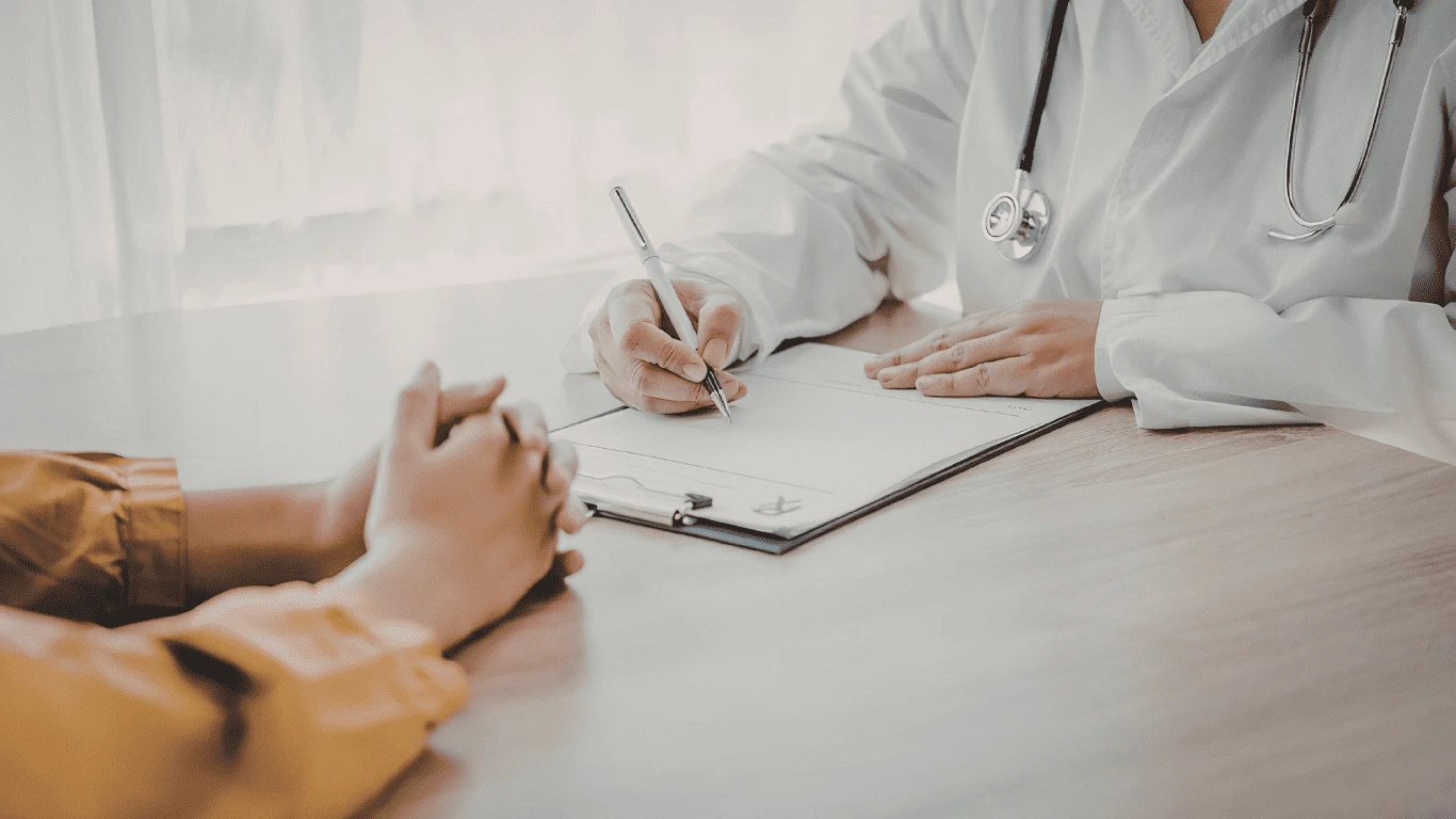 A doctor explaining a test result to a patient
